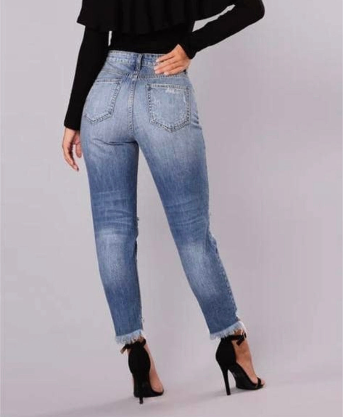 Ripped and Irregular Hemmed Jeans