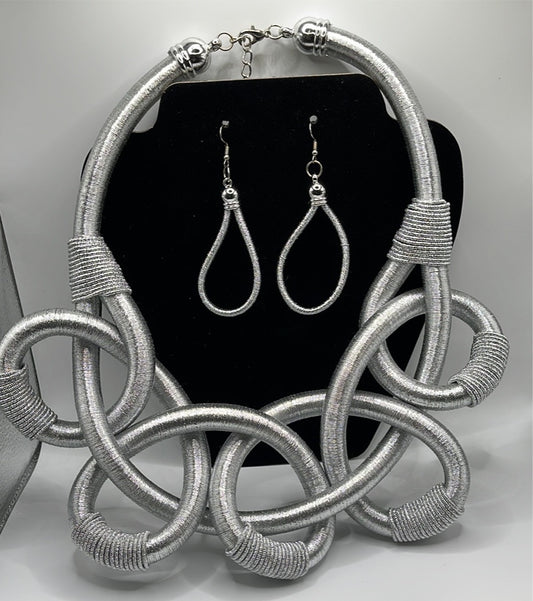 Silver necklace and earring set